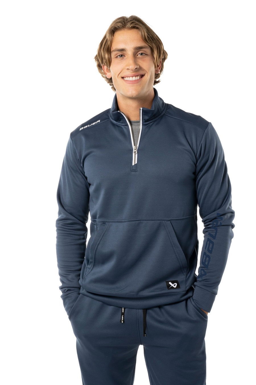 https://www.thehockeyshop.com/cdn/shop/files/bauer-hoodies-s23-bauer-team-fleece-senior-1-2-zip-navy-xs-30850395537474_900x.jpg?v=1698420588