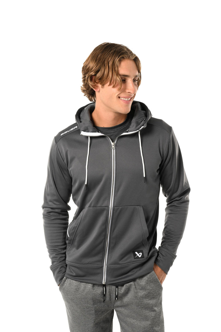 https://www.thehockeyshop.com/cdn/shop/files/bauer-hoodies-s23-bauer-team-fleece-senior-zip-hoody-grey-xl-30850457534530_720x.jpg?v=1698423111