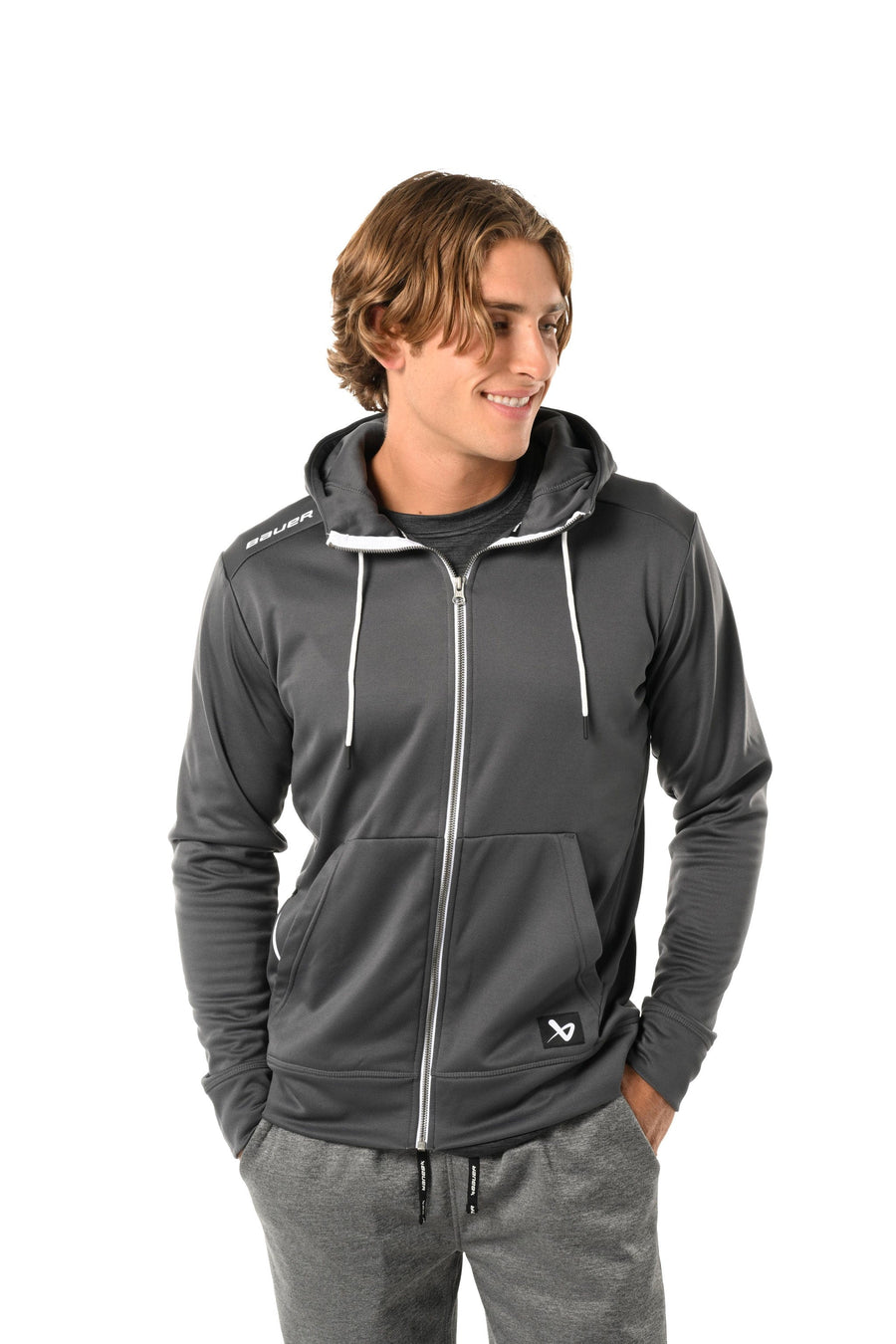 https://www.thehockeyshop.com/cdn/shop/files/bauer-hoodies-s23-bauer-team-fleece-senior-zip-hoody-grey-xl-30850457534530_900x.jpg?v=1698423111