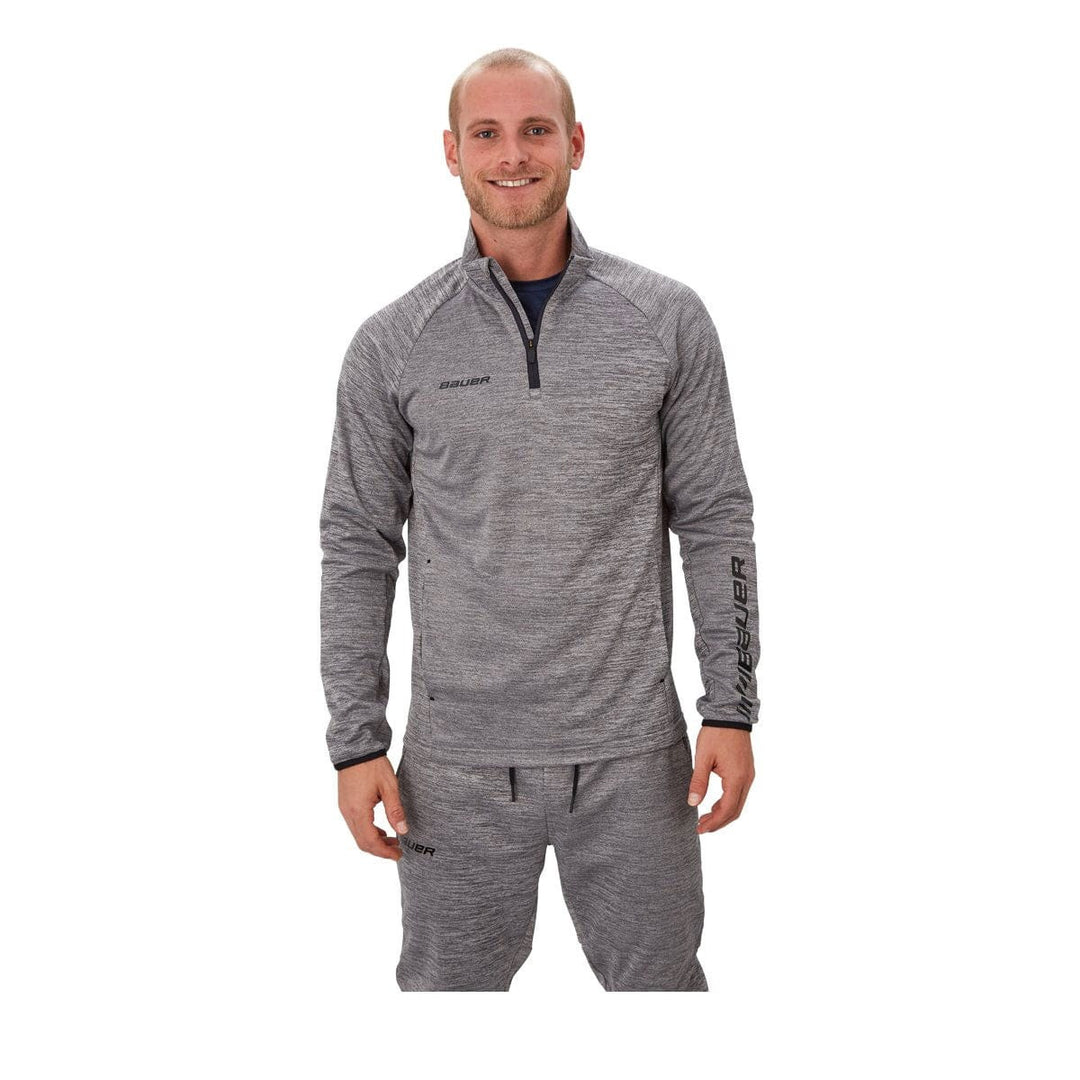 https://www.thehockeyshop.com/cdn/shop/products/bauer-quarter-zips-bauer-vapor-fleece-junior-1-4-zip-jacket-grey-m-28744284995650_1080x.jpg?v=1691106891