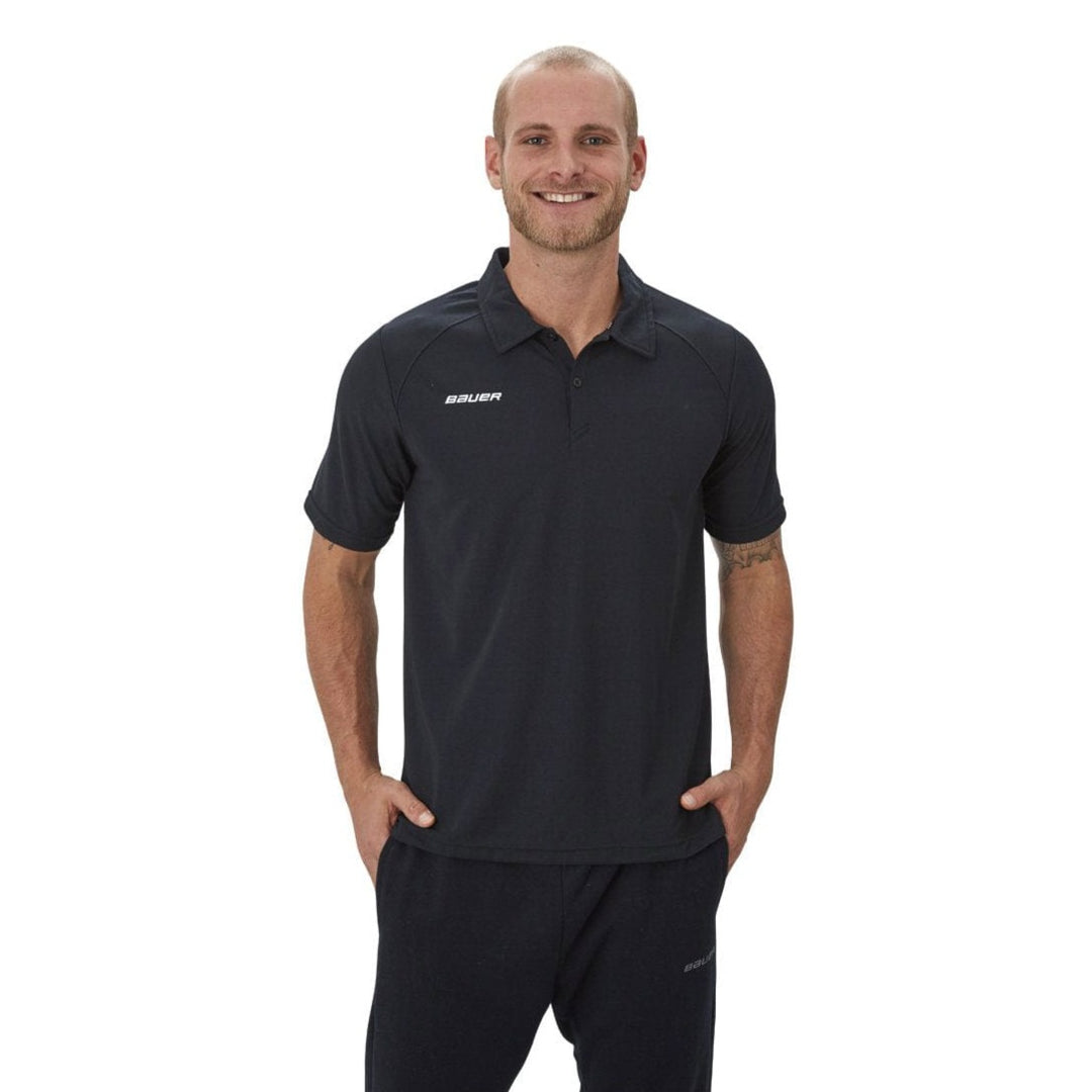 https://www.thehockeyshop.com/cdn/shop/products/bauer-shirts-bauer-vapor-team-pique-senior-polo-shirt-2019-black-xl-28744384249922_1080x.jpg?v=1689977643