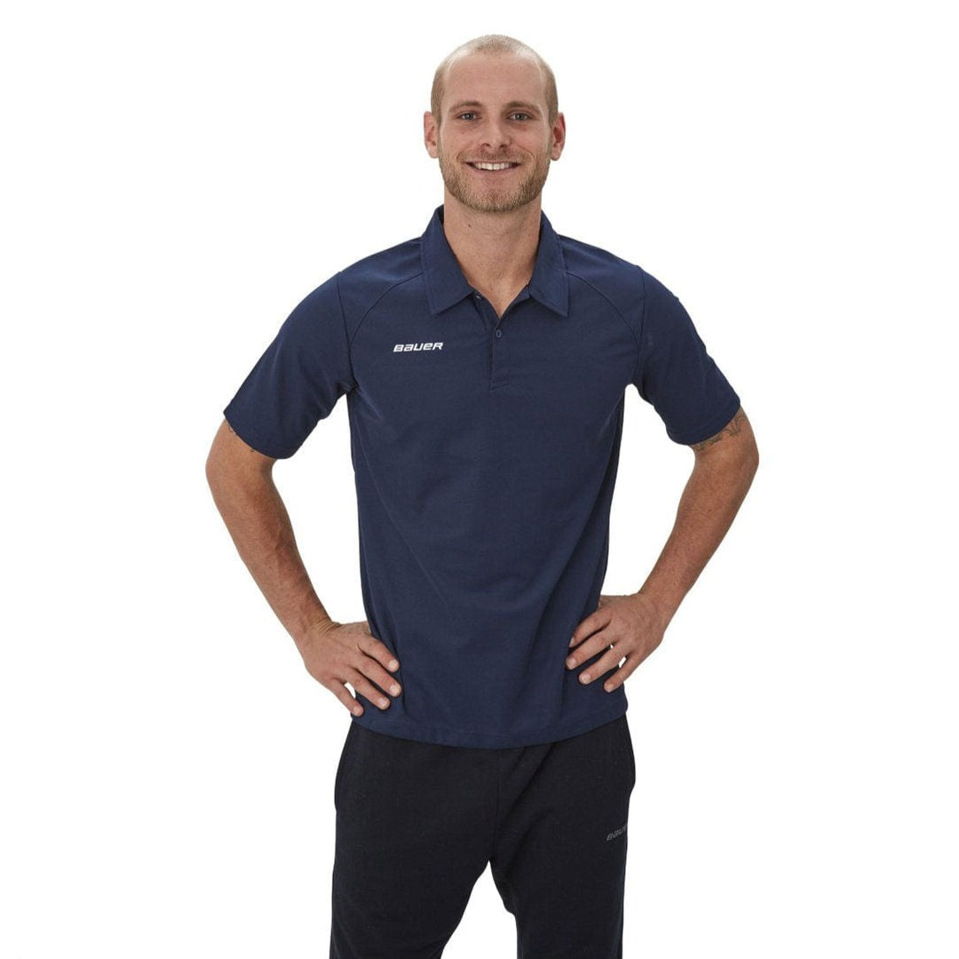 https://www.thehockeyshop.com/cdn/shop/products/bauer-shirts-bauer-vapor-team-pique-youth-polo-shirt-2019-navy-xl-28744384675906_1080x.jpg?v=1689977529