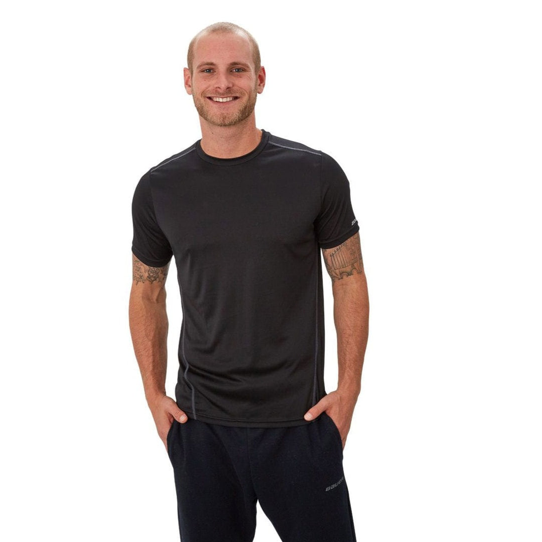 https://www.thehockeyshop.com/cdn/shop/products/bauer-shirts-bauer-vapor-team-tech-shortsleeve-senior-shirt-black-xs-28744385003586_1080x.jpg?v=1689972441