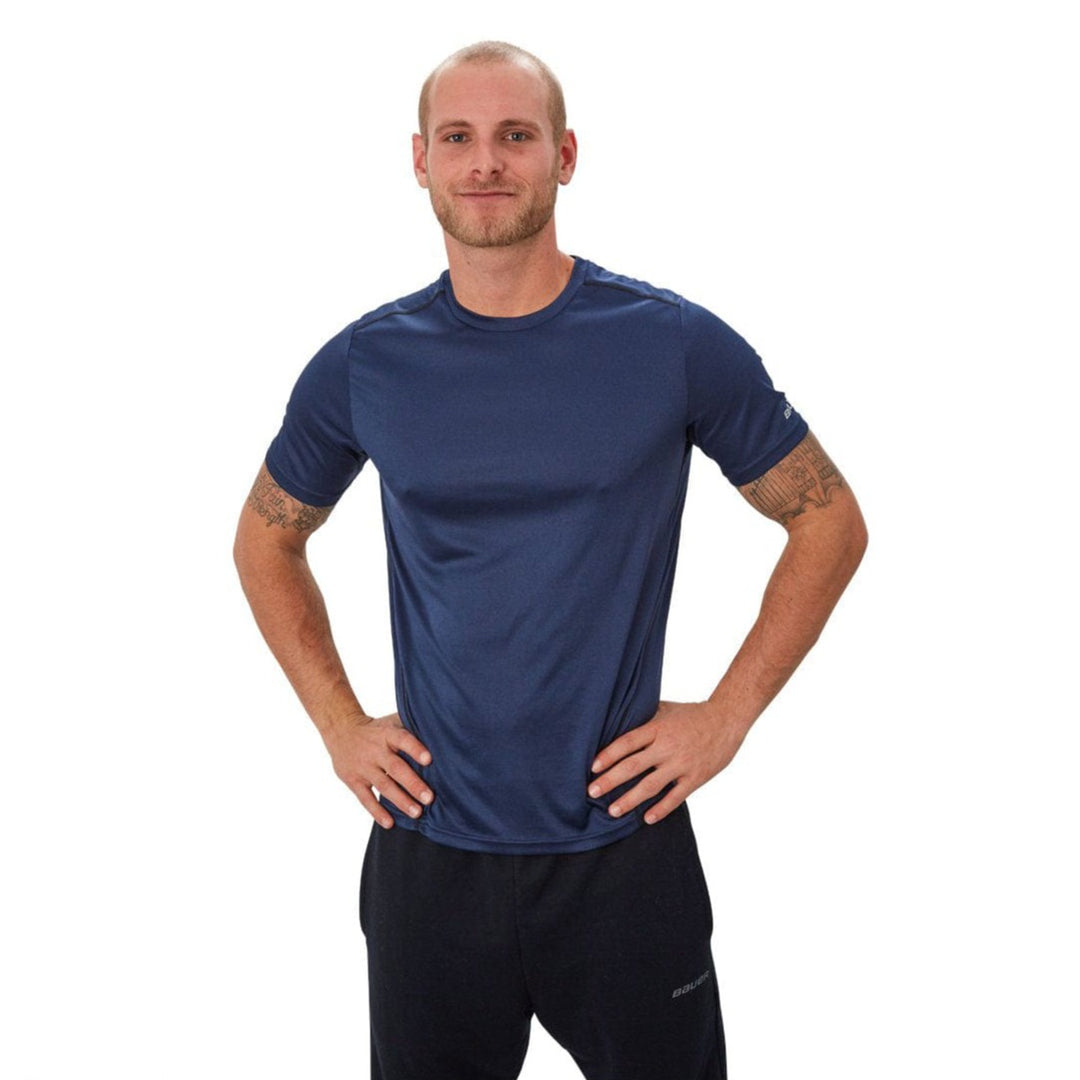 https://www.thehockeyshop.com/cdn/shop/products/bauer-shirts-bauer-vapor-team-tech-shortsleeve-youth-shirt-navy-xs-28744385200194_1080x.jpg?v=1690312811