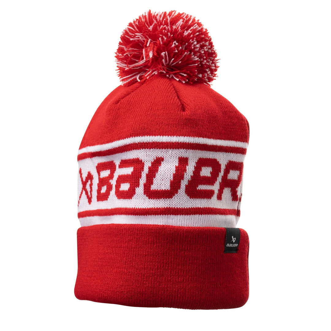 https://www.thehockeyshop.com/cdn/shop/files/bauer-toques-s24-bauer-team-ribbed-pom-toque-red-senior-os-32699543126082_1080x.jpg?v=1735975411