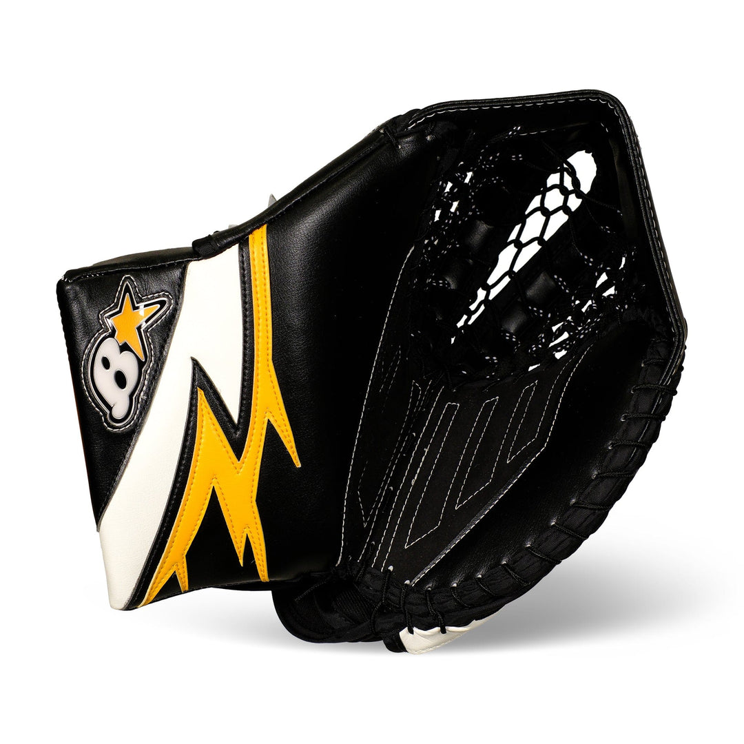 https://www.thehockeyshop.com/cdn/shop/files/brian-s-catchers-brian-s-g-netik-v-senior-goalie-catcher-slash-graphic-black-sport-gold-regular-30642579144770_1080x.jpg?v=1691529894