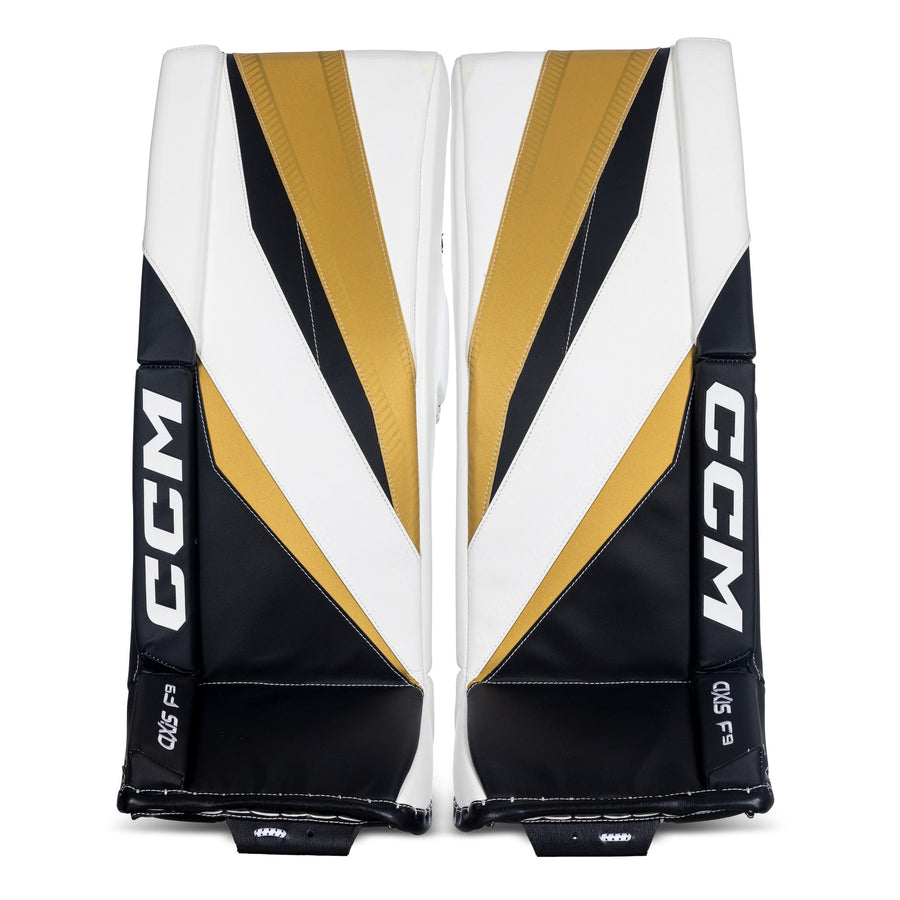 https://www.thehockeyshop.com/cdn/shop/files/ccm-leg-pads-ccm-axis-f9-intermediate-goalie-leg-pads-sdc-white-black-gold-30-1-31552132186178_900x.jpg?v=1714405111