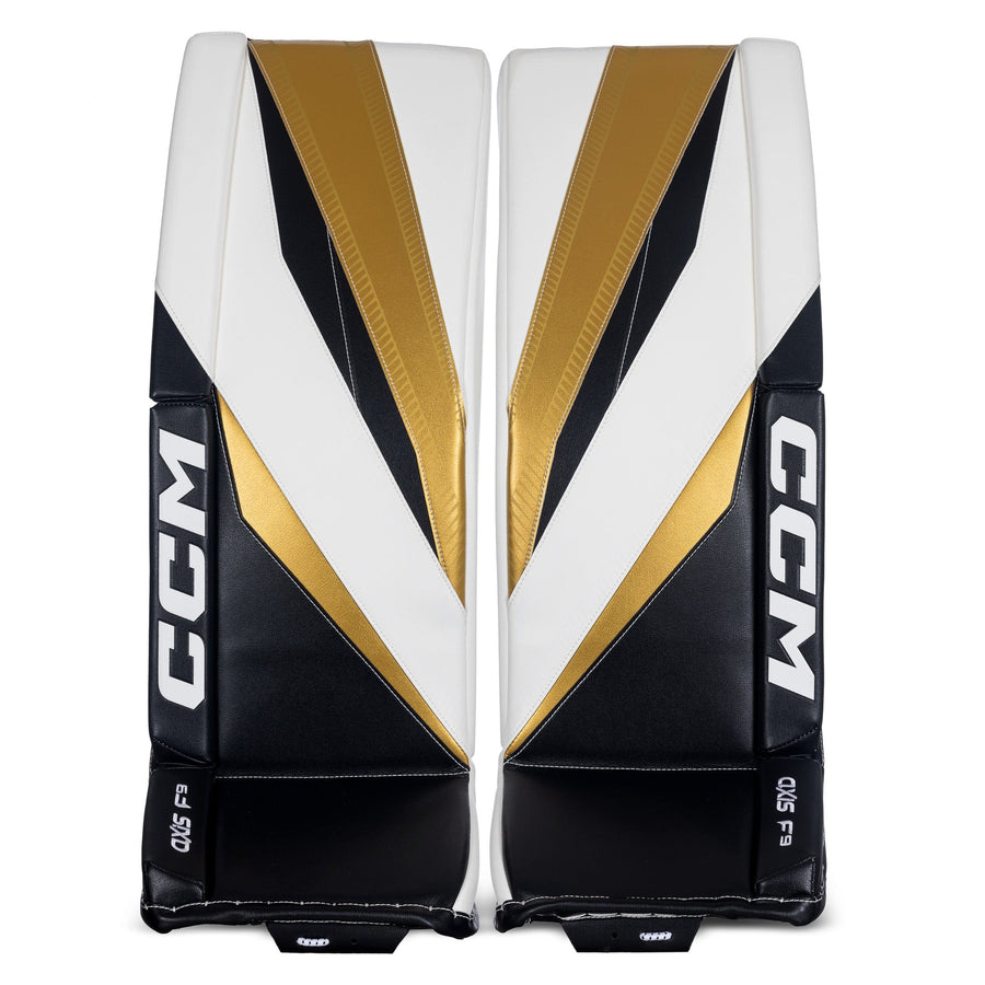 https://www.thehockeyshop.com/cdn/shop/files/ccm-leg-pads-ccm-axis-f9-senior-goalie-leg-pads-sdc-white-black-gold-32-1-5-31552126320706_900x.jpg?v=1714405600