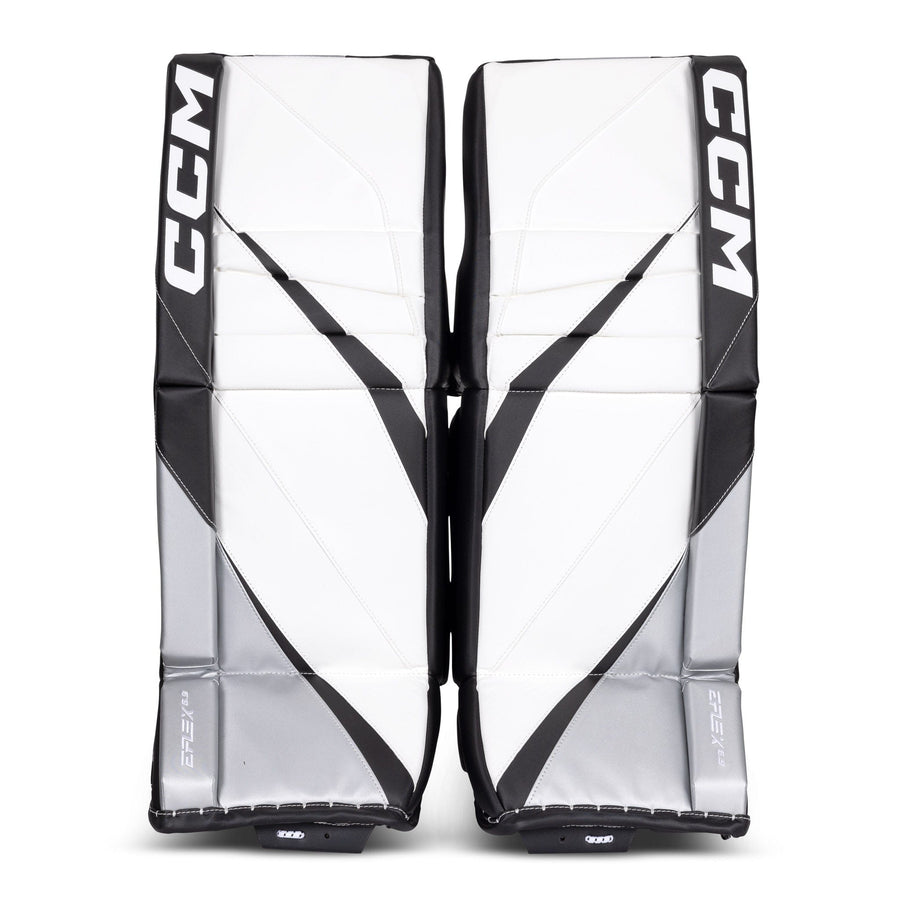 https://www.thehockeyshop.com/cdn/shop/files/ccm-leg-pads-ccm-extreme-flex-e6-9-intermediate-goalie-leg-pads-source-exclusive-white-black-silver-30-1-30705770201154_900x.jpg?v=1693581292