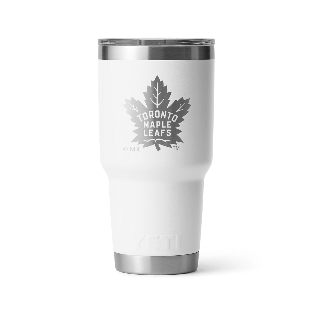 https://www.thehockeyshop.com/cdn/shop/files/yeti-drinkware-yeti-rambler-30oz-tumbler-toronto-maple-leafs-white-30417856102466_1080x.png?v=1683744294